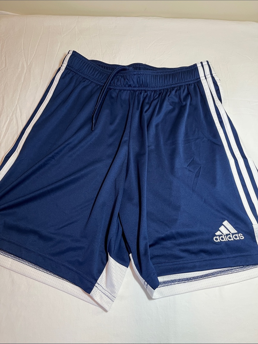 adidas Men's Navy Blue Athletic Shorts with White Stripes, size medium